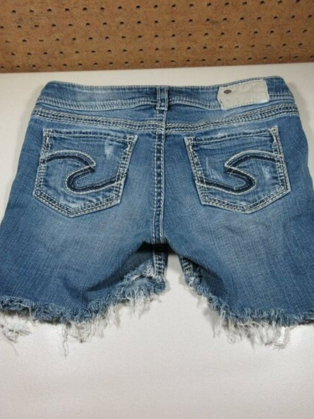 Silver Jeans womens dark distressed Suki 17 stretch cutoff jean shorts 29